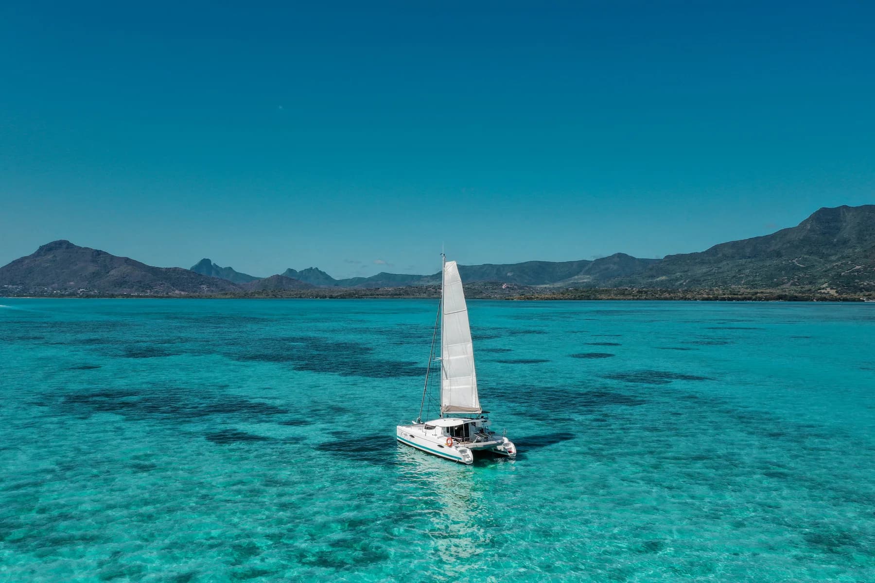 Île aux Bénitiers Private Catamaran Full Day on C'est La Vie