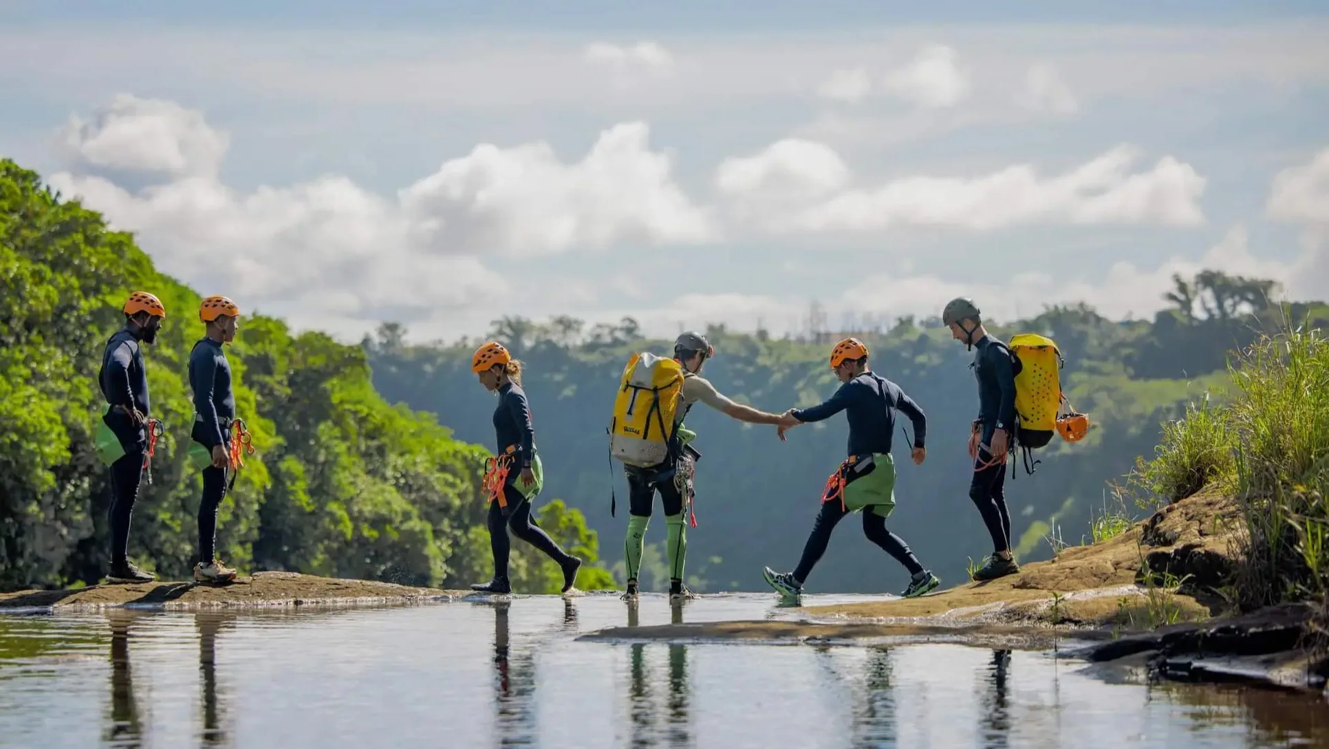 Guided canyoning group preparing for a Tamarind Falls canyon descent in Mauritius